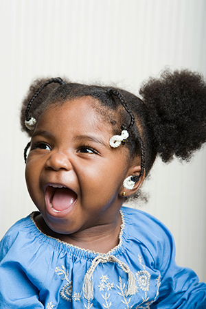 Deaf child with hearing aid